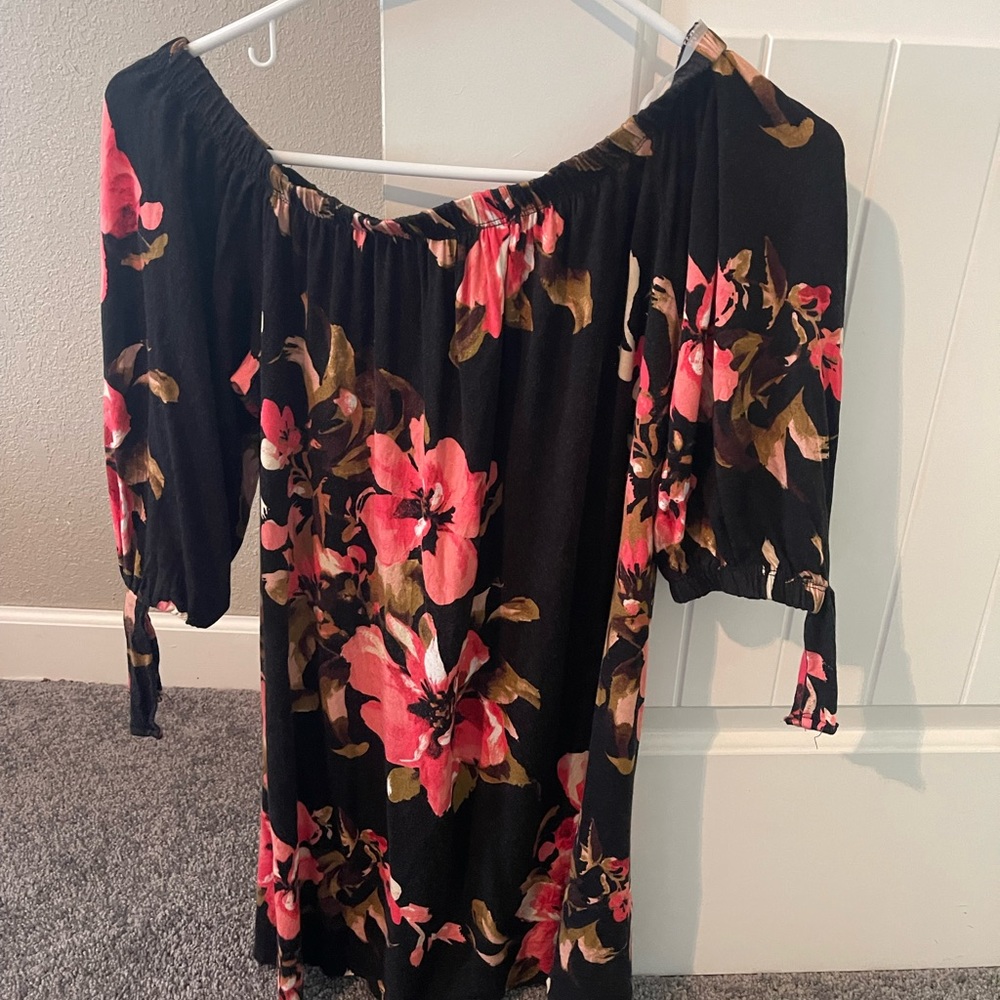 Women’s black and pink floral top.
